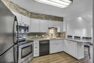 Welcome to StoneGate Manor Town Home #4. This beautiful and - photo 9