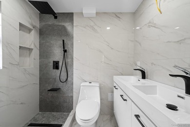 241-49-148th Drive is a meticulously renovated two family tucked - photo 13