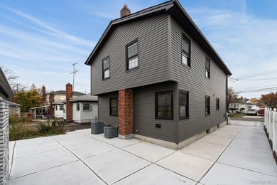 241-49-148th Drive is a meticulously renovated two family tucked - photo 17