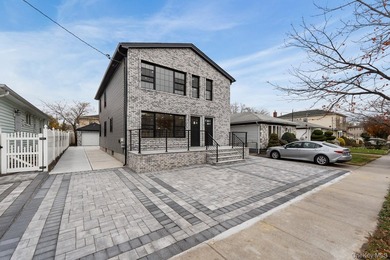 241-49-148th Drive is a meticulously renovated two family tucked - photo 18