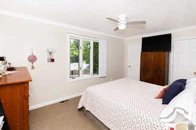 Coming Soon!! Experience peaceful lake living in this - photo 18