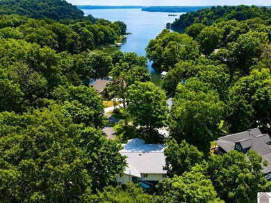 Coming Soon!! Experience peaceful lake living in this - photo 35