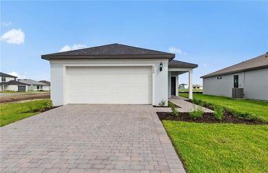 Lake Home For Sale in Lehigh Acres, Florida