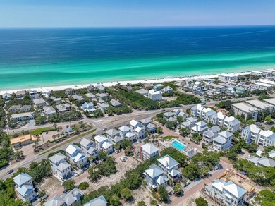 Located in the exclusive, gated community of Seanest Village in - photo 5