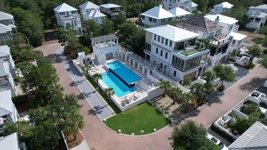 Located in the exclusive, gated community of Seanest Village in - photo 6