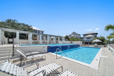Located in the exclusive, gated community of Seanest Village in - photo 8