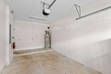 Set within the gated coastal community of Makarios, this - photo 25