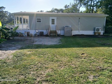 3-bedroom, 2 bath doublewide situated on approximately 1 acre - photo 3