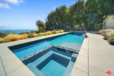 Set on a bluff above Broad Beach, this Balinese-inspired - photo 19