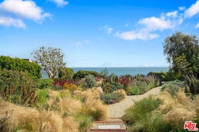 Set on a bluff above Broad Beach, this Balinese-inspired - photo 20