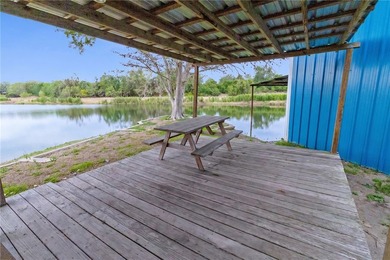 Lakefront retreat on three acres offering rare privacy - photo 5