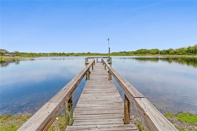 Lakefront retreat on three acres offering rare privacy - photo 8