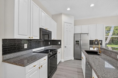 Welcome to this pristine, single-story pool home zoned for - photo 18