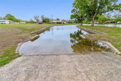 Lakefront retreat on three acres offering rare privacy - photo 9