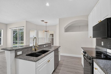 Welcome to this pristine, single-story pool home zoned for - photo 20