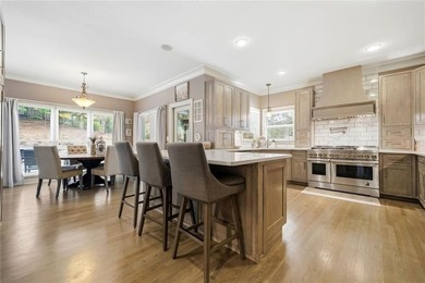 Welcome to luxury living in the prestigious Towne Lake Hills - photo 19