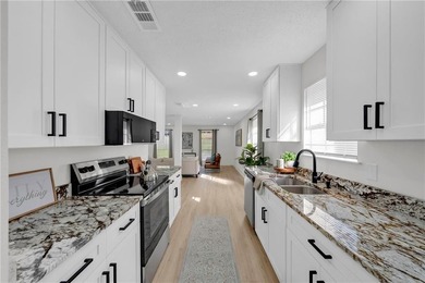 Step into this beautifully remodeled gem featuring 4 spacious - photo 7