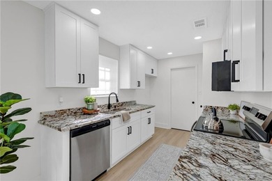 Step into this beautifully remodeled gem featuring 4 spacious - photo 8