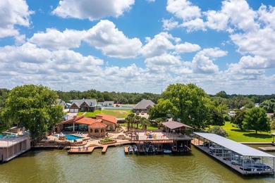 Set on two expansive open-water lots with 170 feet of prime Lake - photo 1