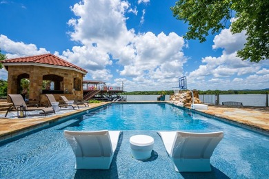 Set on two expansive open-water lots with 170 feet of prime Lake - photo 7
