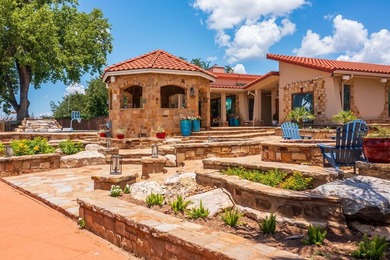 Set on two expansive open-water lots with 170 feet of prime Lake - photo 9