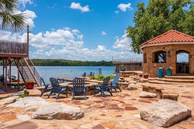 Set on two expansive open-water lots with 170 feet of prime Lake - photo 10