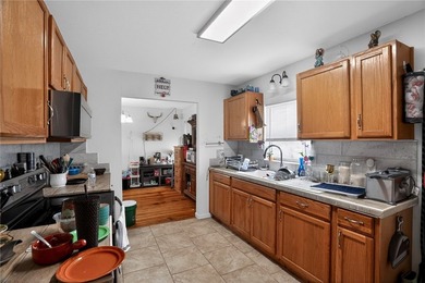 Charming three bed, two bath home with wood floors throughout - photo 13