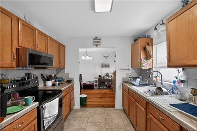 Charming three bed, two bath home with wood floors throughout - photo 14