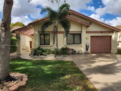 Lake Home For Sale in Coconut Creek, Florida