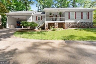 **NO HOA and just minutes from Lake Lanier!** This beautifully - photo 1