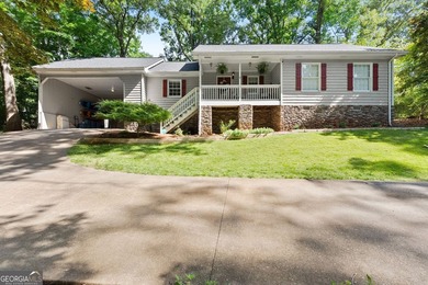 **NO HOA and just minutes from Lake Lanier!** This beautifully - photo 2