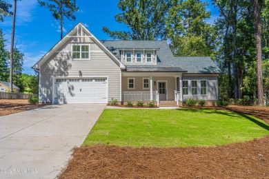 Lake Home For Sale in Whispering Pines, North Carolina