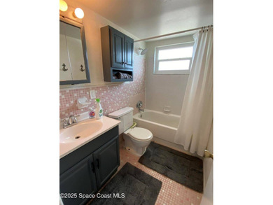 This charming top floor end unit overlooking the sparkling pool - photo 11