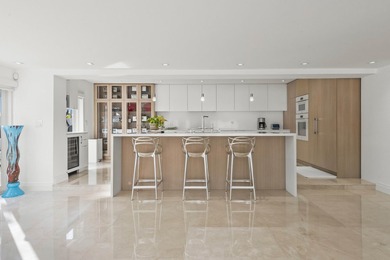 Step into this stunningly reimagined home, where modern elegance - photo 13