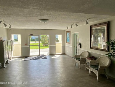 This charming top floor end unit overlooking the sparkling pool - photo 14