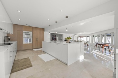 Step into this stunningly reimagined home, where modern elegance - photo 15