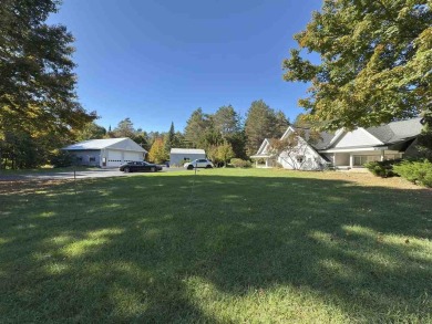 Lake Charlevoix Home For Sale in East Jordan Michigan