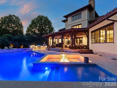 Situated within the prestigious guard-gated community of - photo 1