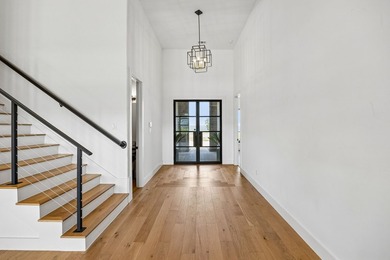 Discover elevated lakeview living in the prestigious Heath Golf - photo 11