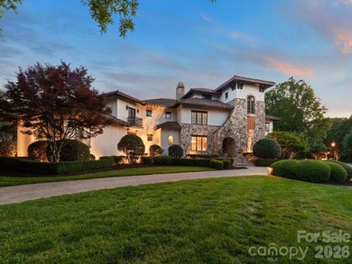 Situated within the prestigious guard-gated community of - photo 2