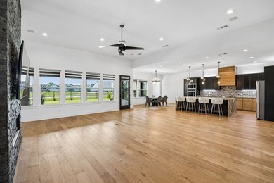 Discover elevated lakeview living in the prestigious Heath Golf - photo 12