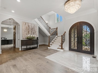 Situated within the prestigious guard-gated community of - photo 5