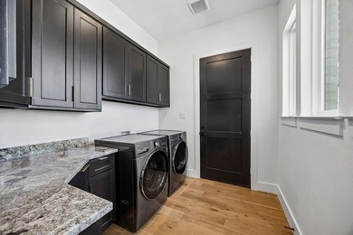 Discover elevated lakeview living in the prestigious Heath Golf - photo 23