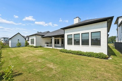Discover elevated lakeview living in the prestigious Heath Golf - photo 26