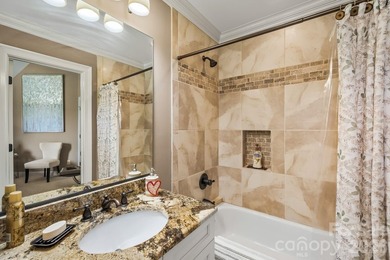 Discover a custom built retreat where timeless elegance, modern - photo 14