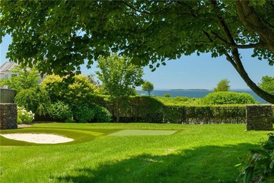 Nestled within the private gates of Carnegie Harbor, one of - photo 32