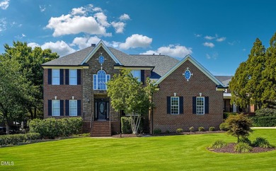 Perfect for entertainers alike, this beautiful all brick home - photo 1