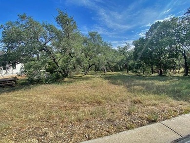 Located in Horseshoe Bay West, this level lot offers an easy - photo 2