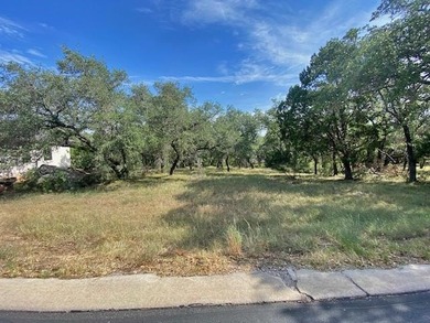 Located in Horseshoe Bay West, this level lot offers an easy - photo 3