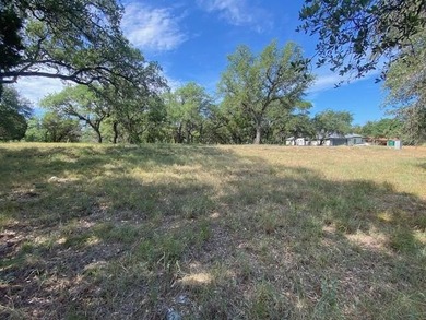 Located in Horseshoe Bay West, this level lot offers an easy - photo 6